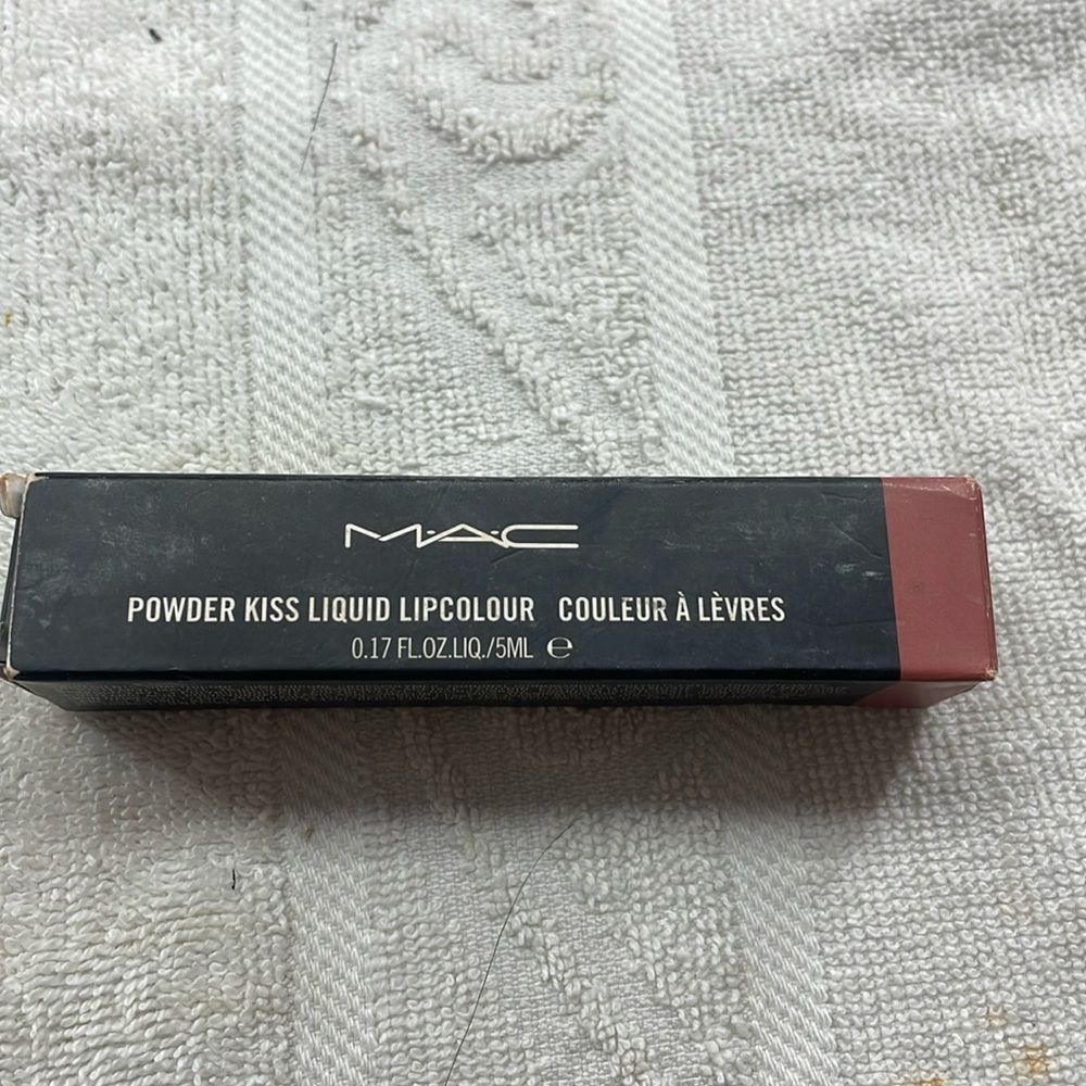 New in  box MAC Powder Kiss liquid lip color. size 0.17 Fl oz.